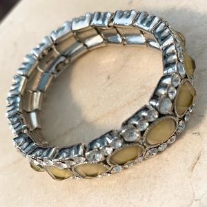 Stretchy faux bracelet with amber colored stones